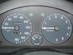 Picture of the dials on an imported Japanese car, showing the need for speedometer conversion to mph