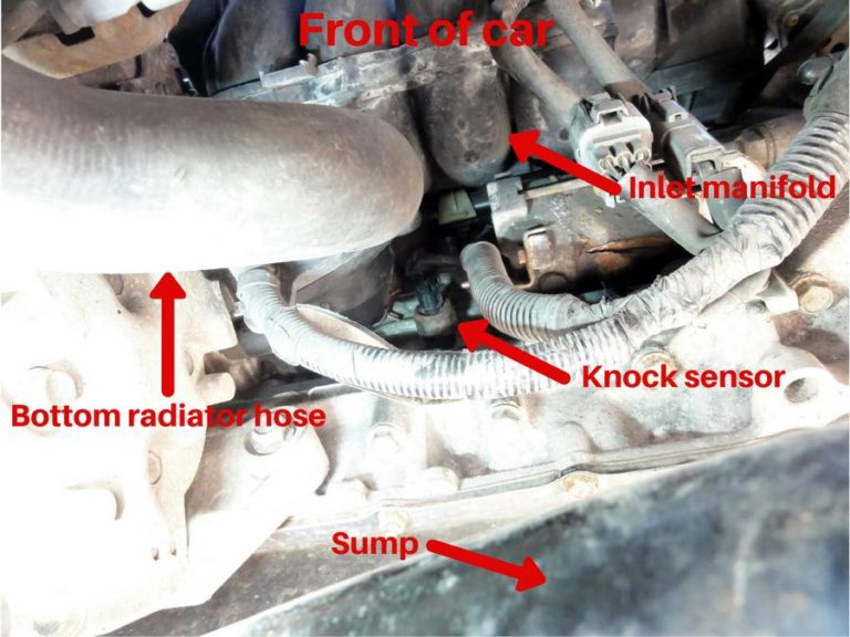 Picture showing location of knock sensor causing Honda P0325 code