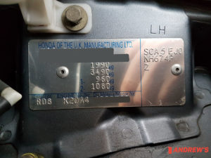 Picture of a Honda CR-V VIN plate showing towing weights