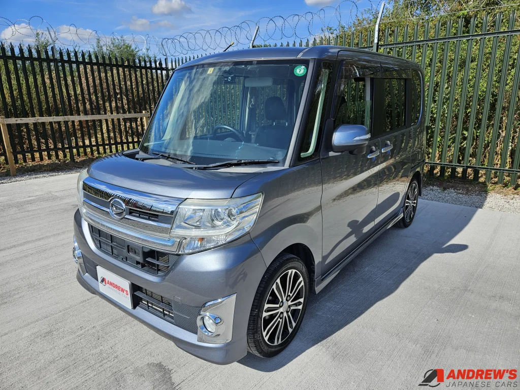 Picture of the front left quarter of a 2014 LA600S Daihatsu Tanto Custom RS kei car