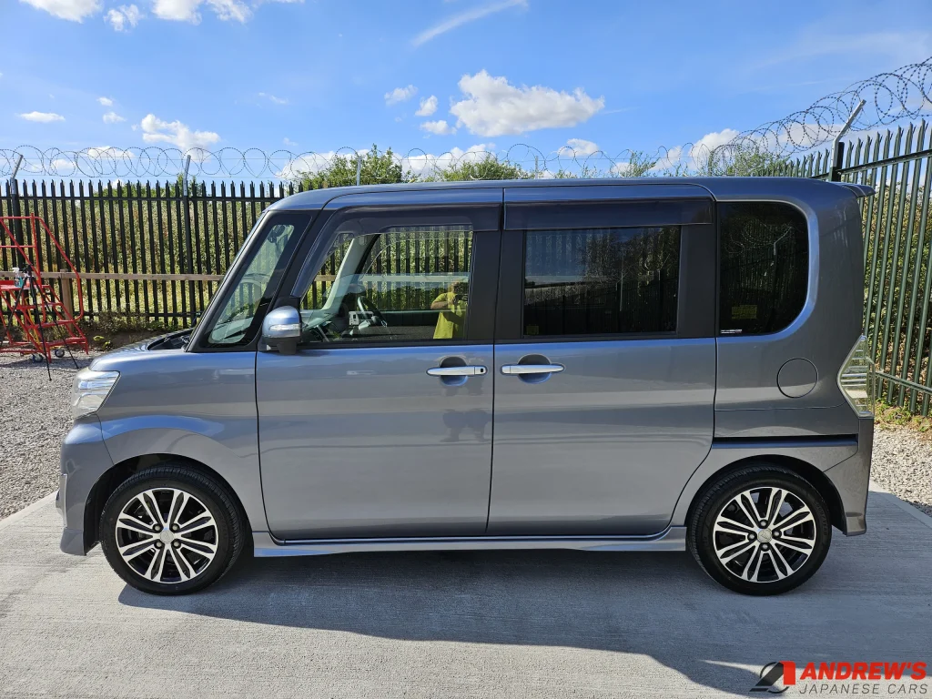 Picture of the left hand side of a grey metallic Daihatsu Tanto Custom RS for sale